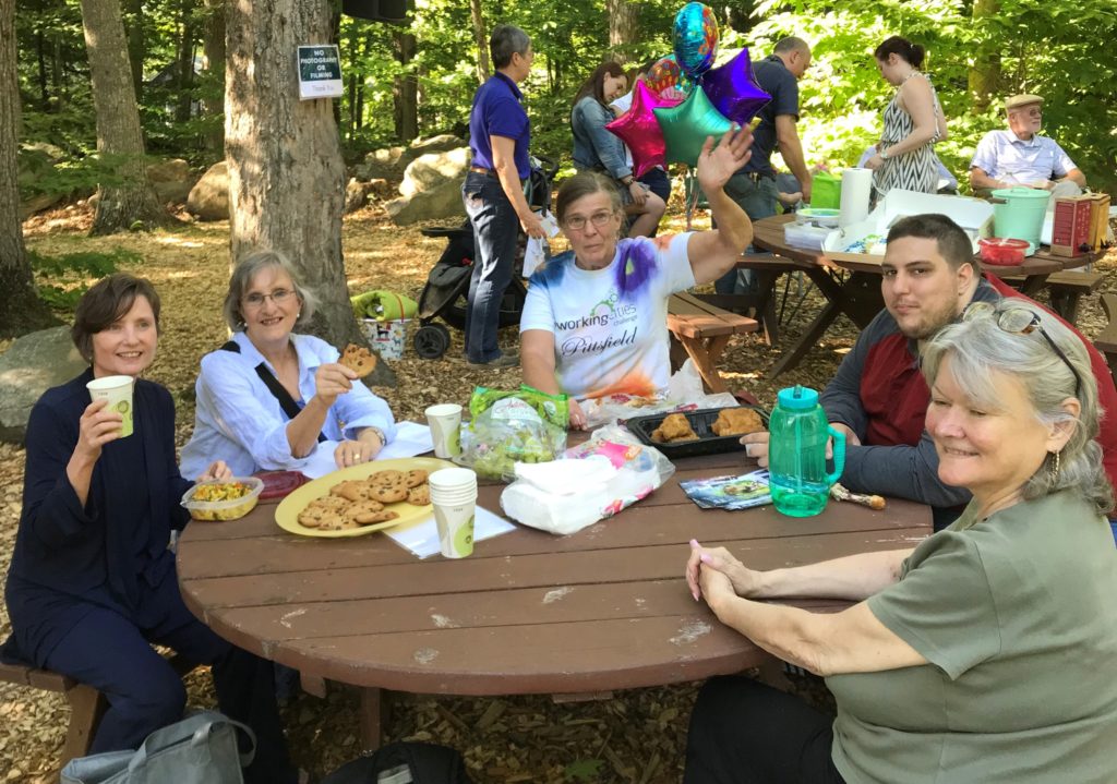 group of people at picnic table